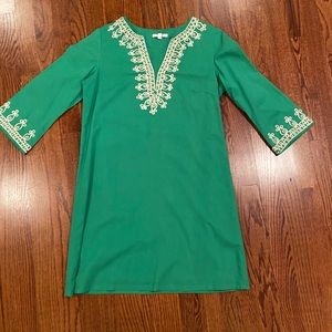 Green and gold women’s dress